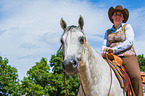 woman rides Quarter Horse
