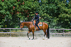 woman rides Quarter Horse