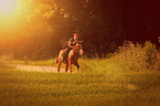 woman rides Shagya Arabian Horse