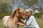 woman and Shetland Pony stallion