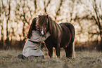 woman and Shetland Pony