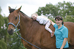 woman, child and warmblood