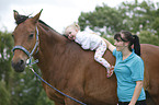 woman, child and warmblood