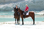 riders with horses