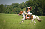 woman rides warmblood
