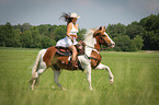 woman rides warmblood