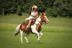 woman rides warmblood
