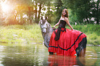 woman rides warmblood