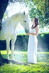 woman and white horse