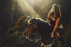 woman rides warmblood