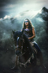 woman rides warmblood