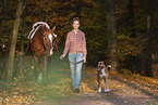 woman, dog and horse