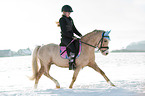 woman rides Welsh B