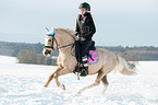 woman rides Welsh B