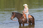 woman rides Welsh-Cob