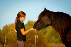 young woman with Welsh Cob