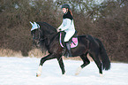 woman rides Welsh D