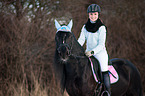 woman rides Welsh D