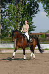 woman rides horse