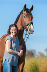 woman and Westphalian Horse