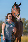 woman and Westphalian Horse