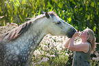 woman and Haflinger-Andalusian