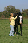 young woman with horse