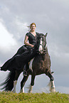 young woman riding Irish Tinker