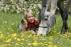 young woman with arabian horse