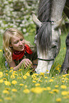 young woman with arabian horse