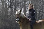 young woman with Haflinger