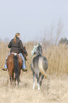 riding with near horse