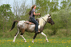 woman rides Pintaloosa
