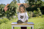 girl with Greek tortoise