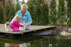 people at a Goldfish pond