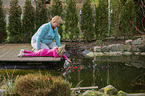 people at a Goldfish pond