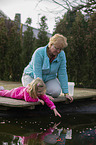 people at a Goldfish pond