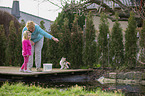 people at a Goldfish pond