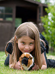 girl with guinea pig