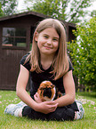 girl with guinea pig