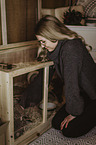 woman with dwarf Hamster