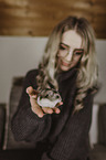 woman with dwarf Hamster