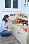 woman with Guinea Pig