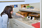 woman with Guinea Pig