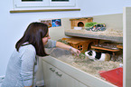 woman with Guinea Pig