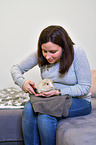 woman with Guinea Pig