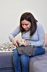 woman with Guinea Pig