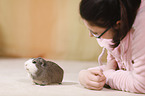 young woman with guinea pig