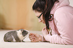 young woman with guinea pig