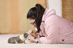 young woman with guinea pig